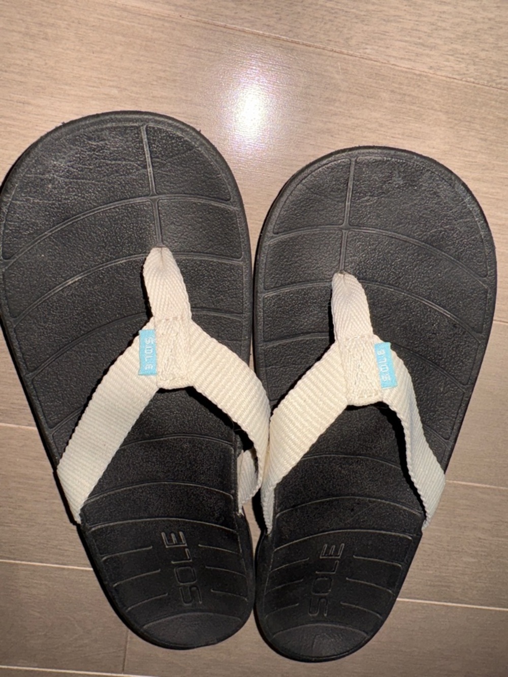 Women’s SOLE Black Flip-Flop Sandals with Cream Straps